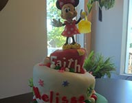 Topsy Turvy Minnie Mouse Cake by Gina